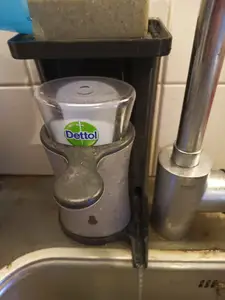 Holder for Dettol liquid soap dispencer and a bar of soap