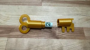 Key shaped money holder