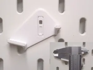 Caliper holder for SKADIS