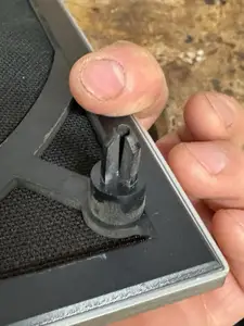 Speaker grills pin