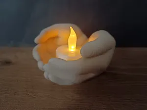 Palms on a tea light