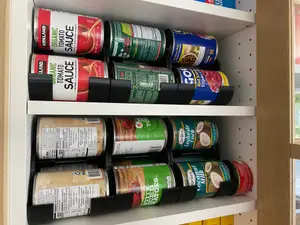 Can organizer and dispenser for first in first out (FIFO) organization in pantries and cabinets