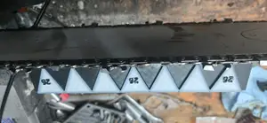 Chainsaw sharpening guide.