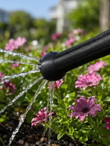 Soda bottle water sprinkler