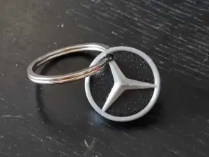 Mercedes-Benz key ring pendant featuring a star emblem
