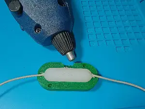 A form for injecting hot glue to hermetically seal the wire connection