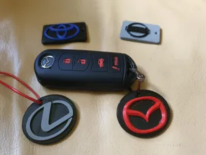 Keychain with logo. Acura, BAIC, Buick, BYD, Cadillac, Chery, Chevrolet, Dodge, Ford, GMC, for Honda, Hyundai, Infiniti, Isuzu, Jaecoo, Jeep, KIA, Lexus, Lincoln, Mazda, MG, Mitsubishi, Nissan, Omoda, RAM, Subaru, Suzuki, Tesla, Toyota.