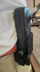 Insta360 X5 with DJI Mic Mini belt carryon with stick