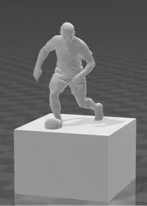 a figurine of a football player on a pedestal