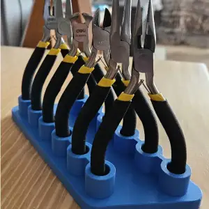 Holder for mini pliers