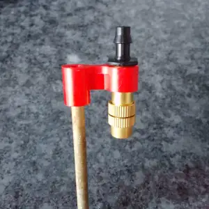 Holder for Water Spray Nozzle to use in pot plants