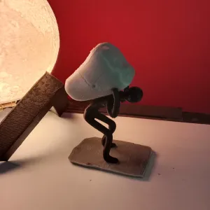 Hombre que carga roca