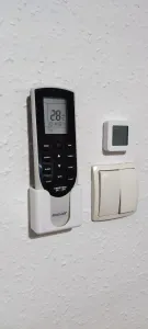 Wall mounted air conditioning remote control holder