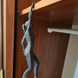 balancing hanging female climber (low poly style)