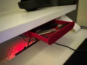 Mini drawer that you can stick under the table.