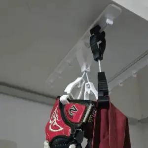 Motorcycle, bicycle, cloth holder, glove holder