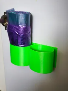 TRASH BAG ROLL HOLDER
