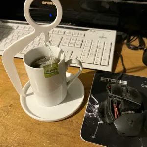 Mug holder, tea bag holder