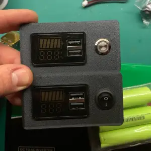 Voltmeter and button mountplate