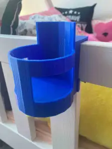 Bottle holder for children's bed