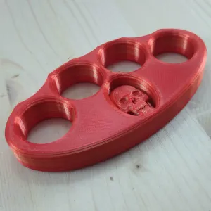 Knuckle Duster with a skull inside the body