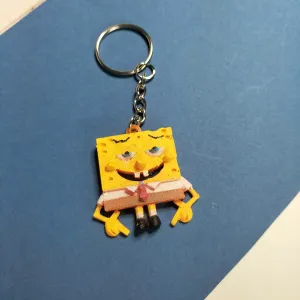 LLAVERO Y BROCHE DE BOB.