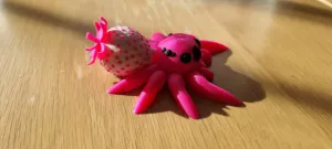 Strawberry jumping spider-articulated flexi toy