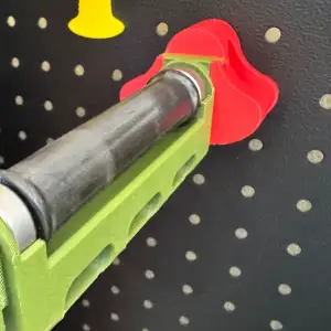Pegboard filament roller holder for TPU top loading mod.