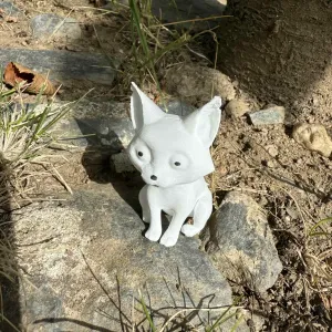 Sitting cute/creepy cat