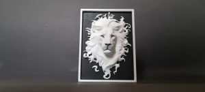 Bas-relief sculpture of a lion's head