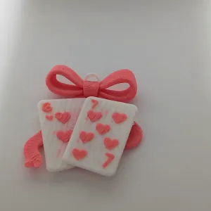 Playing Cards with a bow with 6 and 7