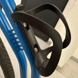 Bicycle bottle bidon holder