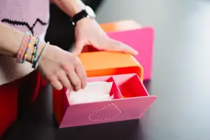 Menstrual product dispensers