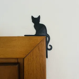 Cat Peeking from the Door Corner