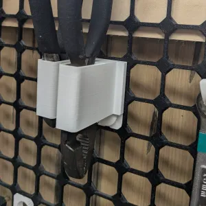 Opengrid plier slot holder