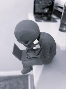 Skeleton sitting on the shelf