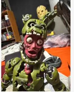 Articulated spring trap