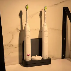 Electric tooth brush stand/holder/station