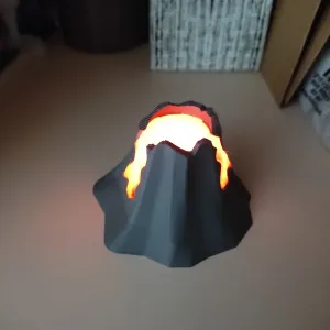 Erupting volcano with glowing lava