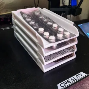 Stack trays of tablet package