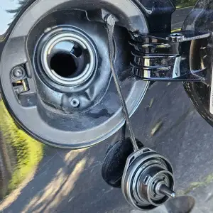 VW fuel cap holder