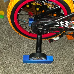 Training wheel holder for indoors kids riding