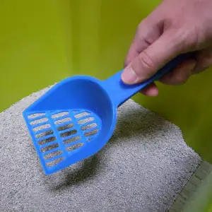pala para arenero gato