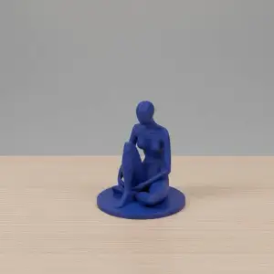 Sitting Woman Figurine