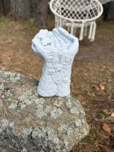 Garden sculpture ''Nature Held in Hands''