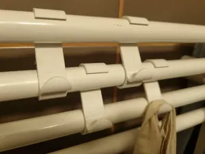 Radiator towel hook