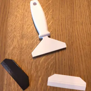SCRAPER / WHIPER WITH CHANGEABLE BLADES