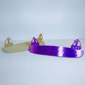 Sunshade for eyeglasses with sailboat motif
