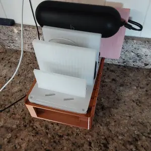 Phone charging station with storage