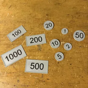 Coins, currency, tokens for playing or for a board game